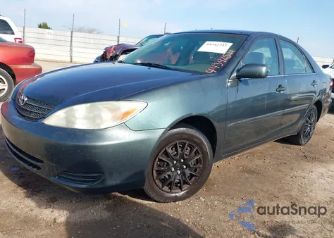 2003 Toyota Camry Le z USA, uszkodzony, nr VIN 4T1BE32K93U658998